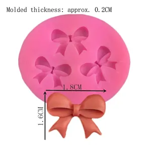 Pink silicone bow mold for fondant cakes with 1.8cm size bows and 0.2cm thickness