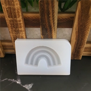 Detail of DIY rainbow silicone mold for fondant cake bordering and handmade soap craft