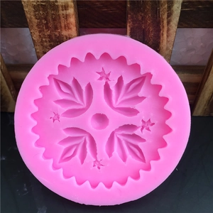 Pink circular silicone lily and maple leaf mold for fondant cake decorating and baking