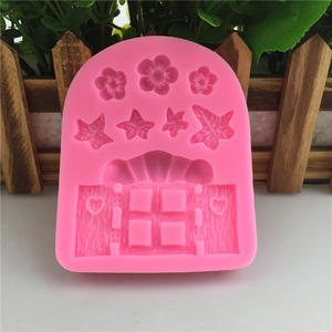 Pink silicone mold with flower leaf and window door patterns for fondant cake decorating