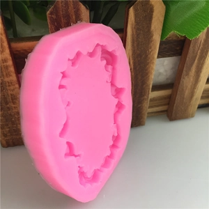 Pink silicone mold with scalloped edges for DIY handmade soap and fondant cake decorating
