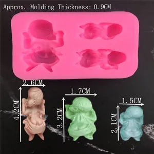 Pink silicone baby mold for fondant cakes with three different sizes and finished examples