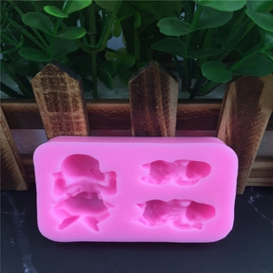 Pink silicone baby mold with four cavities for fondant cake decorating and DIY crafts