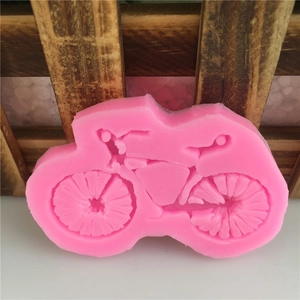 Pink silicone mold with vintage motorcycle shape for DIY fondant cake decorating