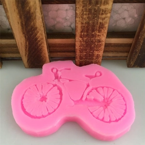 Pink bicycle shaped silicone mold for DIY handmade fondant cake and craft decorations