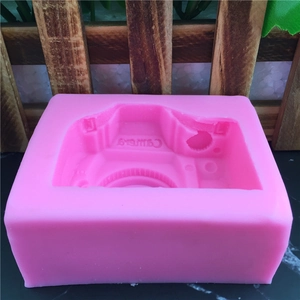 Pink silicone camera mold for fondant, cake decorating, and DIY craft chocolate making