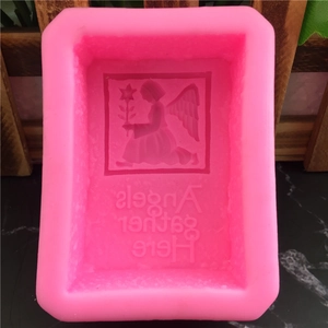 Pink silicone angel mold featuring embossed Angels Gather Here text for fondant or crafts