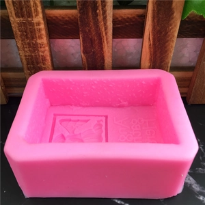 Pink rectangular silicone mold with angel and hand made text for soap or cake decor