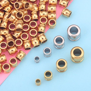 Various sizes of gold and silver stainless steel drum beads for DIY jewelry making