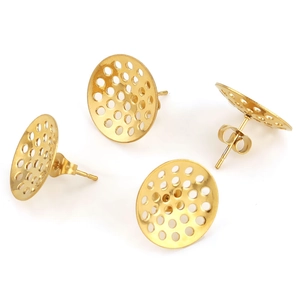 Macro shot of gold-plated hollow disc stud earrings and butterfly backs on white base