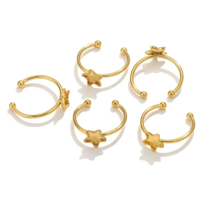 Set of 5 minimalist gold-plated star open rings with spherical ends on white background