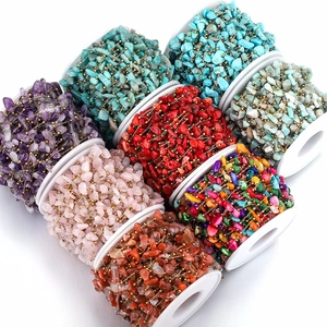 Detail of natural gemstone bead chain rolls for DIY jewelry making in various colors