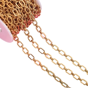 Gouden roestvrijstalen ovale schakelketting op roze spoel voor DIY sieraden maken