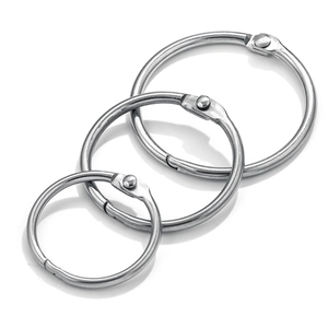 Three silver stainless steel binder rings in various sizes for DIY loose-leaf binding