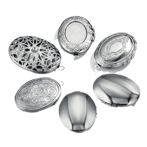 Oval stainless steel locket pendants with vintage floral relief and silver finish
