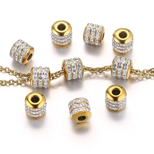 Perles cylindriques en acier doré avec trois rangées de cristaux pour bijoux DIY