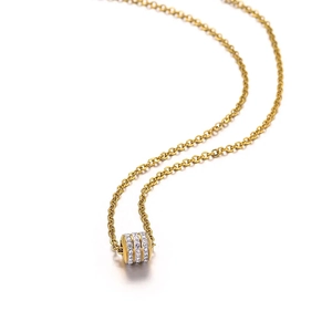 Collier en acier inoxydable doré avec pendentif cylindrique à trois rangées de strass