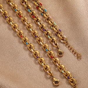 Bracciale a catena in acciaio inossidabile dorato con punti smaltati colorati su raso