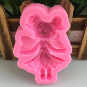 Pink silicone mold featuring an angel girl figure for handmade cake fondant and soap crafts