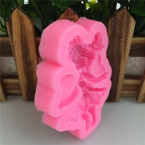 Pink flower-shaped silicone mold for handmade soap, candles, and cake decorating
