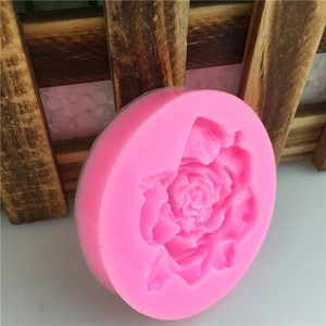 Pink silicone flower mold for handmade soaps and cake fondant decoration in round shape