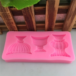Pink silicone mold featuring three distinct European style vase shapes for cake decorating