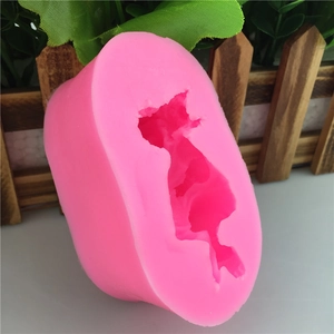 Pink silicone mold featuring a graceful ballerina dancer shape for fondant and soap crafts