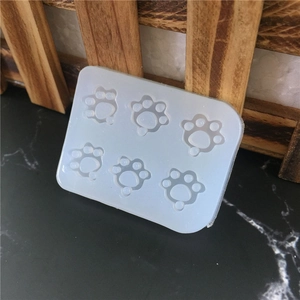 DIY silicone mold featuring six cute dog paw print cavities for soap and resin crafts