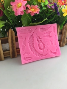 Pink silicone feather mold with various shapes for fondant, chocolate and DIY crafts