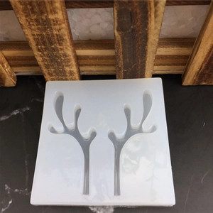 Macro detail of the antler-shaped silicone mold for DIY resin art and fondant decoration