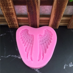 Moule en silicone rose en forme de cœur avec motifs d'ailes d'ange pour décoration de gâteau