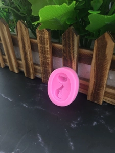 Pink silicone fox mold for DIY chocolate cake and handmade crafts on marble background