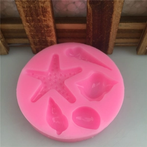 Pink round silicone ocean theme mold with starfish and seashells for fondant cake decor