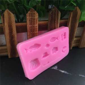 Pink silicone fishing themed mold for fondant cake decorating and DIY chocolate