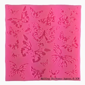 Pink butterfly silicone mold for fondant cake decorating with various shapes and sizes