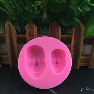 Pink silicone face mold with two different facial shapes for fondant and DIY cakes