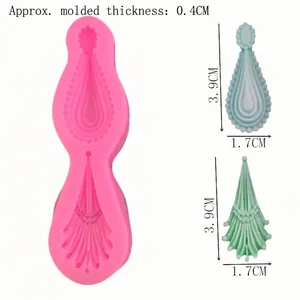 Pink silicone gemstone pendant mold with wave and tassel patterns for DIY baking and crafts