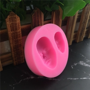 Pink silicone face mold for fondant cakes and handmade soap DIY craft decorations
