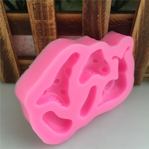 Pink silicone mold with various mushroom shapes for fondant cake and chocolate DIY