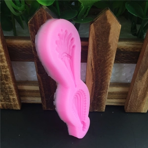 Pink silicone mold for gemstone flower pendants and DIY fondant cake decoration
