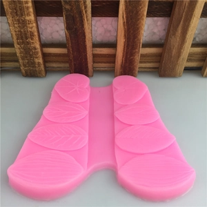 Pink silicone leaf mold for fondant chocolate and DIY cake decorating with detailed textures