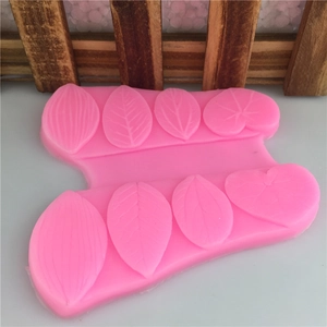 Pink silicone mold with 8 leaf patterns for fondant cake decoration and DIY baking