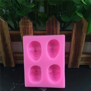 Pink 4-cavity silicone face mold for DIY fondant cake decorating and clay crafting
