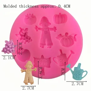 Pink silicone mold with pumpkin, scarecrow and grape shapes for DIY fondant cake baking