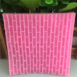 Pink silicone cake mold with castle brick wall texture for fondant decoration and baking