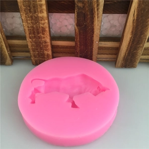 Pink round silicone mold featuring a detailed bull head for DIY fondant and handmade soap