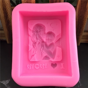 Pink silicone mold featuring Mother's love and I Love Mom design for fondant and candles