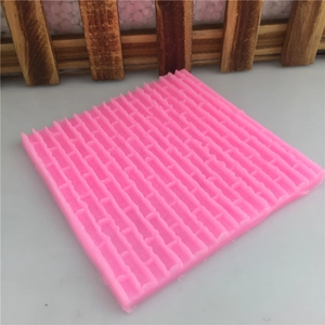 Pink silicone mold with castle brick wall texture for cake fondant decorating and baking