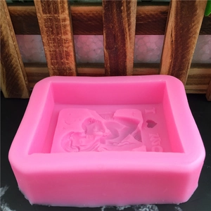 Pink rectangular silicone mold with 3D couple carving and I LOVE YOU text for fondant cakes