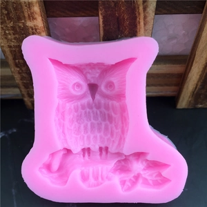 Pink owl silicone fondant mold for handmade cake decoration with detailed feather patterns